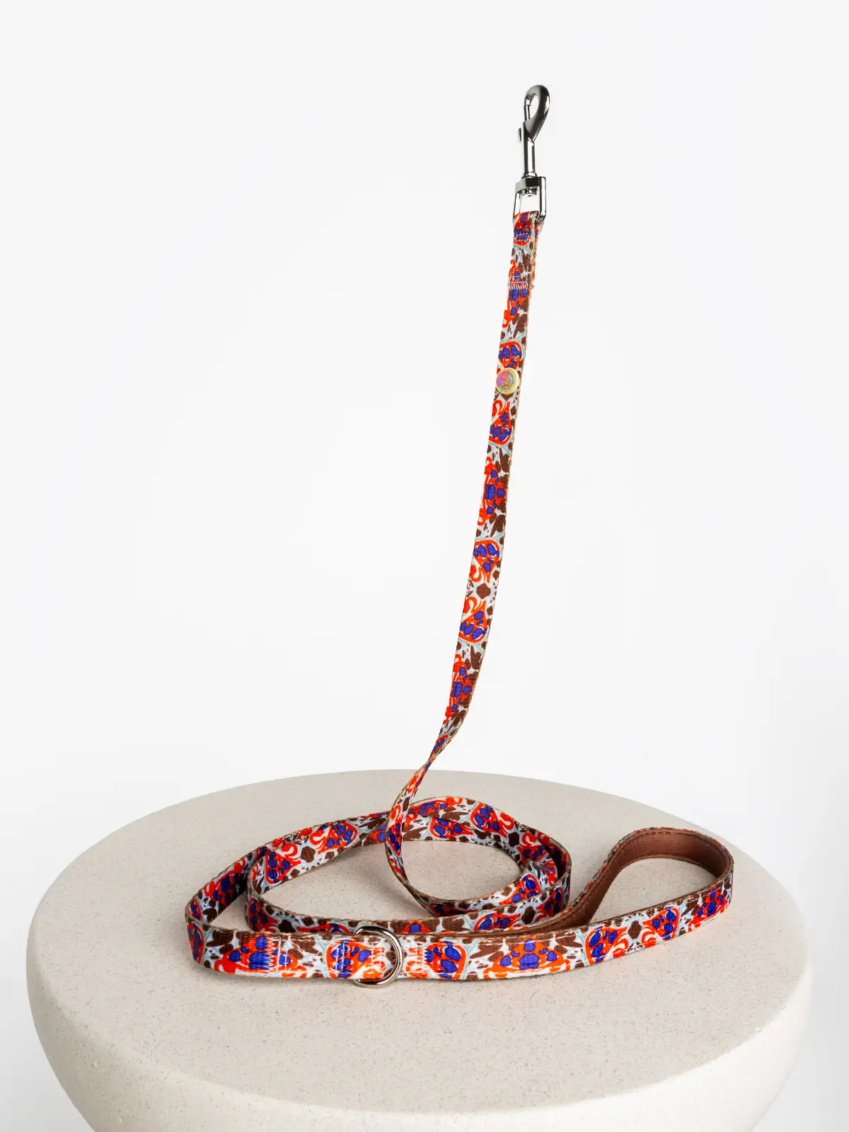 le-chouchou-paris-luxury-dog-harness Sienne Glow designer dog leash on a stone table with silver hardware – Le ChouChou Paris